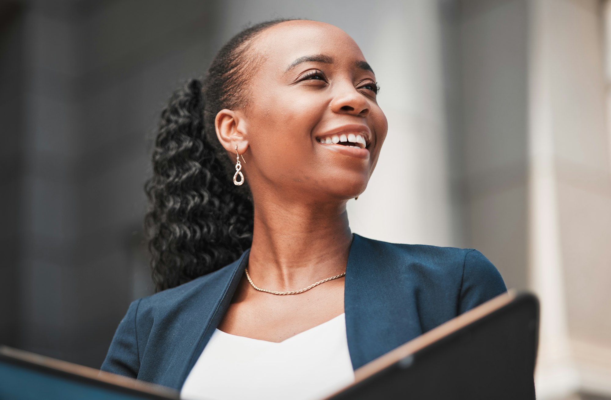 Book, happy black woman or lawyer thinking with smile, research or empowerment working in a law fir